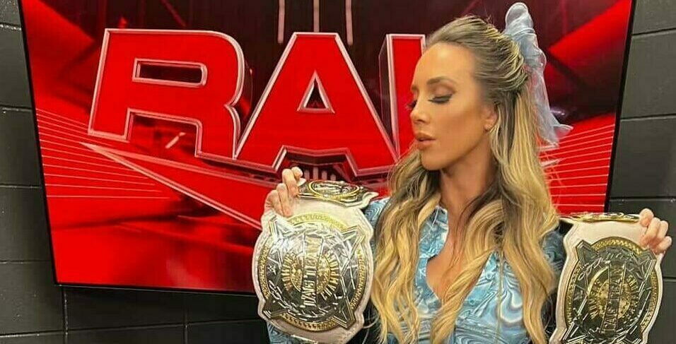 WWE Women's Tag Team Championhip belts Chelsea Green banner